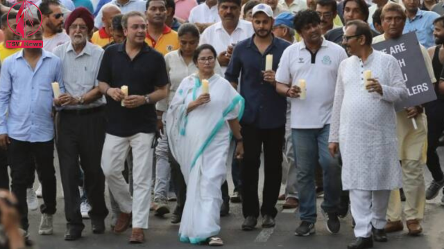 West Bengal CM Mamata Banerjee takes part in a candlelight march in Kolkata on Thursday