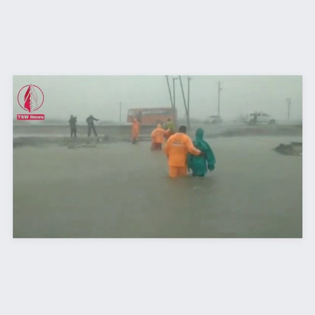 NRDF members rescuing a couple of people