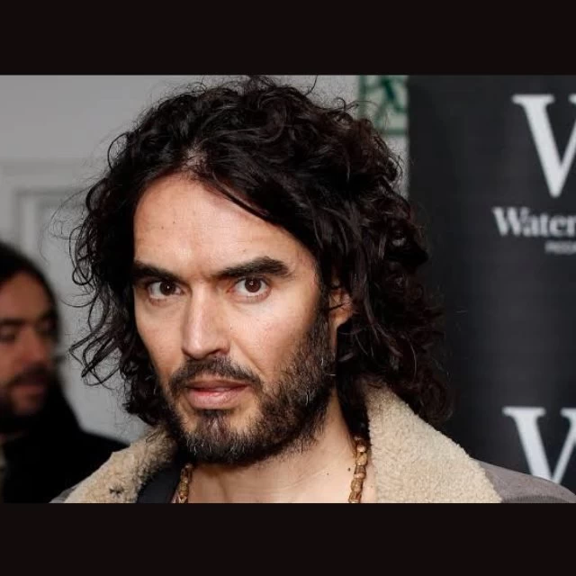 YouTube suspends monetization on Russell Brand's channel following sexual assault allegations, citing violations of creator responsibility policy.